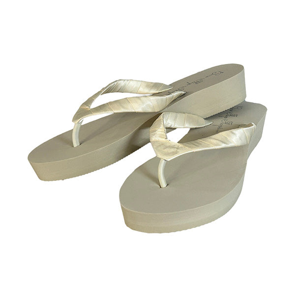 White High 3.5 Inch Wedge Infinity Circle Rhinestone Embellishment Flip Flops