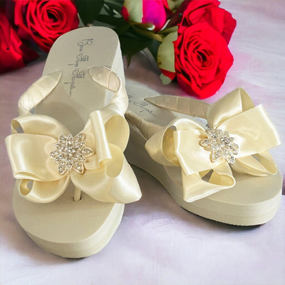Rhinestone Crown High Wedge Flip Flops with Satin Bows